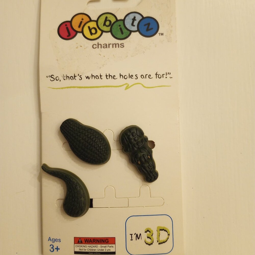 New, 2 Jibbitz Charm Sets - 3 piece crocodile set and 4 piece star set